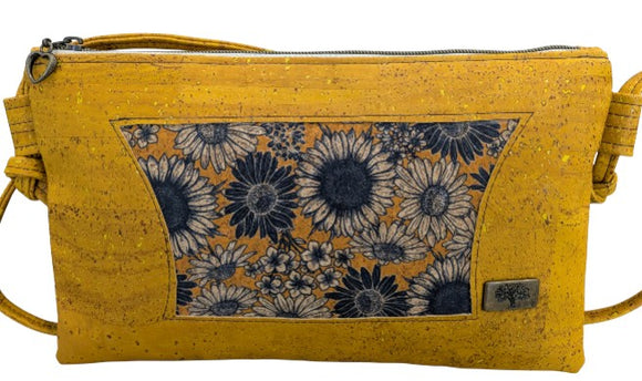 Yellow cork handbag with blue daisy pattern and tree of life emblem